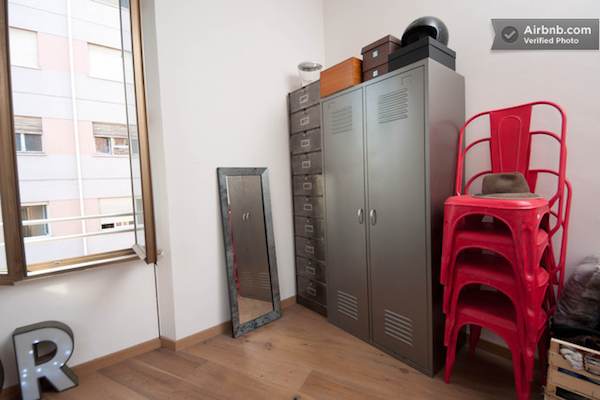 locker-room-style-storage-in-rome-apartment Locker Room Style Storage in Rome Loft Apartment